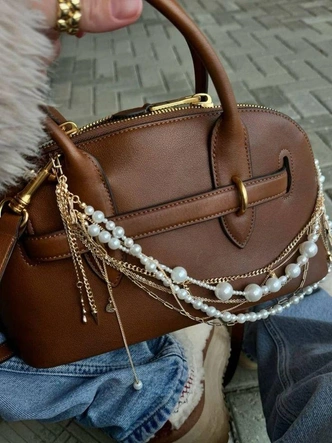 Жемчуг снова в тренде: 4 способа носить его небанально