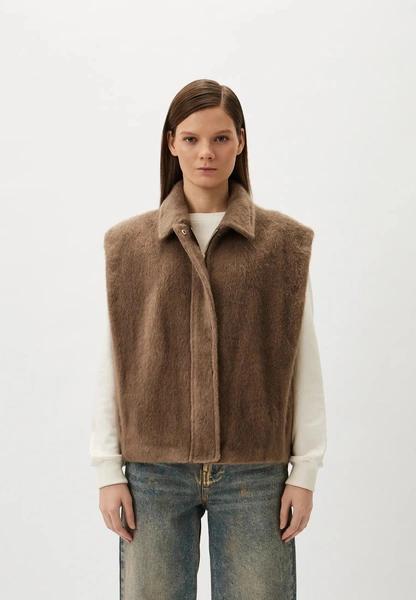 Меховые жилетки снова в тренде, но не те, что мы любили в нулевых