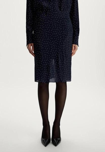 Polka dot остается с нами и этой зимой: где купить «теплый» горошек и как его стилизовать