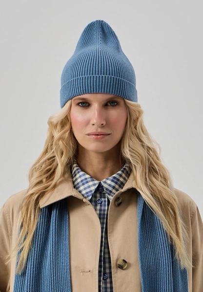 Шапки, береты и кепки: самые модные головные уборы зимы 2025/26