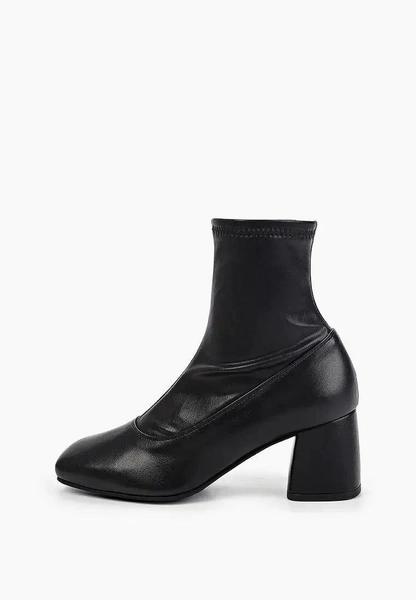 Теплая обувь: выбираем стильную пару на холодный сезон у российских брендов