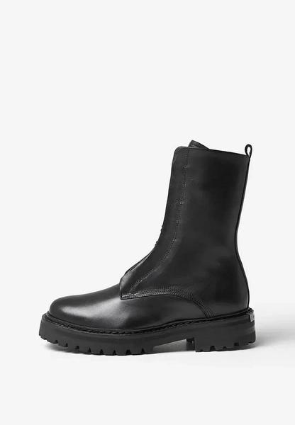 Теплая обувь: выбираем стильную пару на холодный сезон у российских брендов