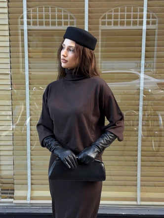 Длинные кожаные перчатки — самый женственный микротренд зимы