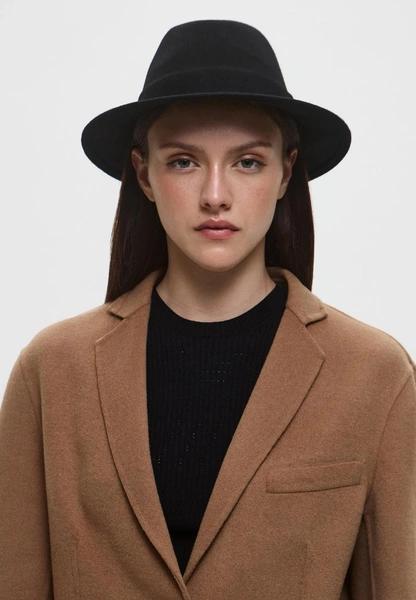 Olsen tuck: заправлять волосы под одежду — новый модный прием от сестер Олсен